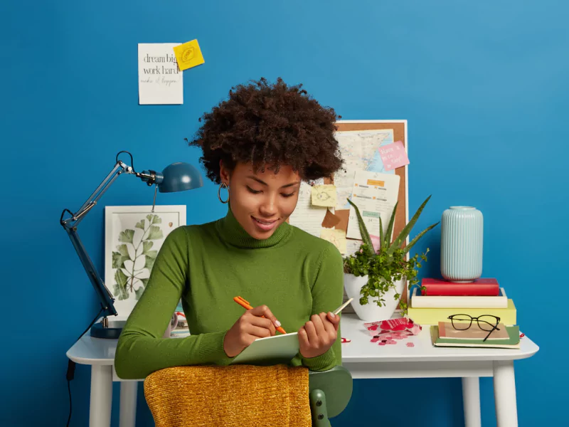 The girl is creating a study routine 