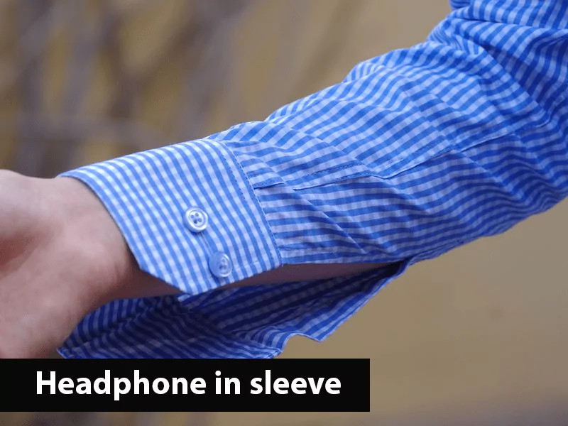 The image shows a man’s sleeve referring to the traditional headphone in sleeve cheating method The image shows a man’s sleeve referring to the traditional headphone in sleeve cheating method